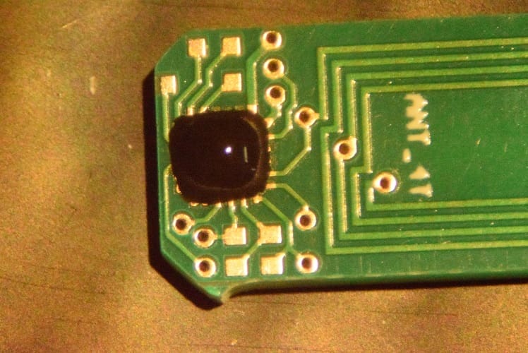 A close up of the bottom of an electronic device.