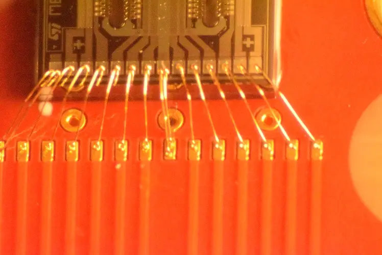 A close up of some orange plastic tubes