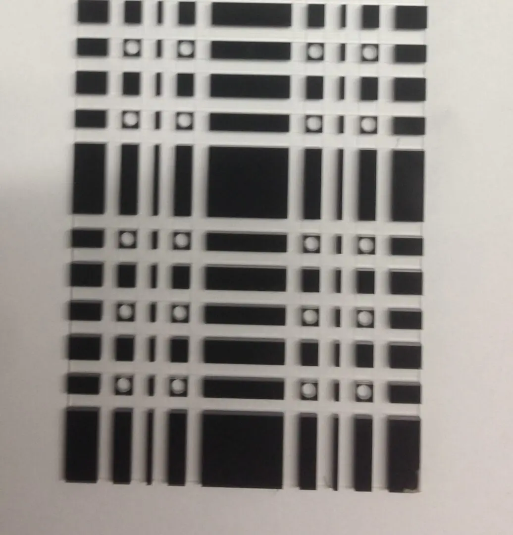 A black and white picture of a plaid pattern.